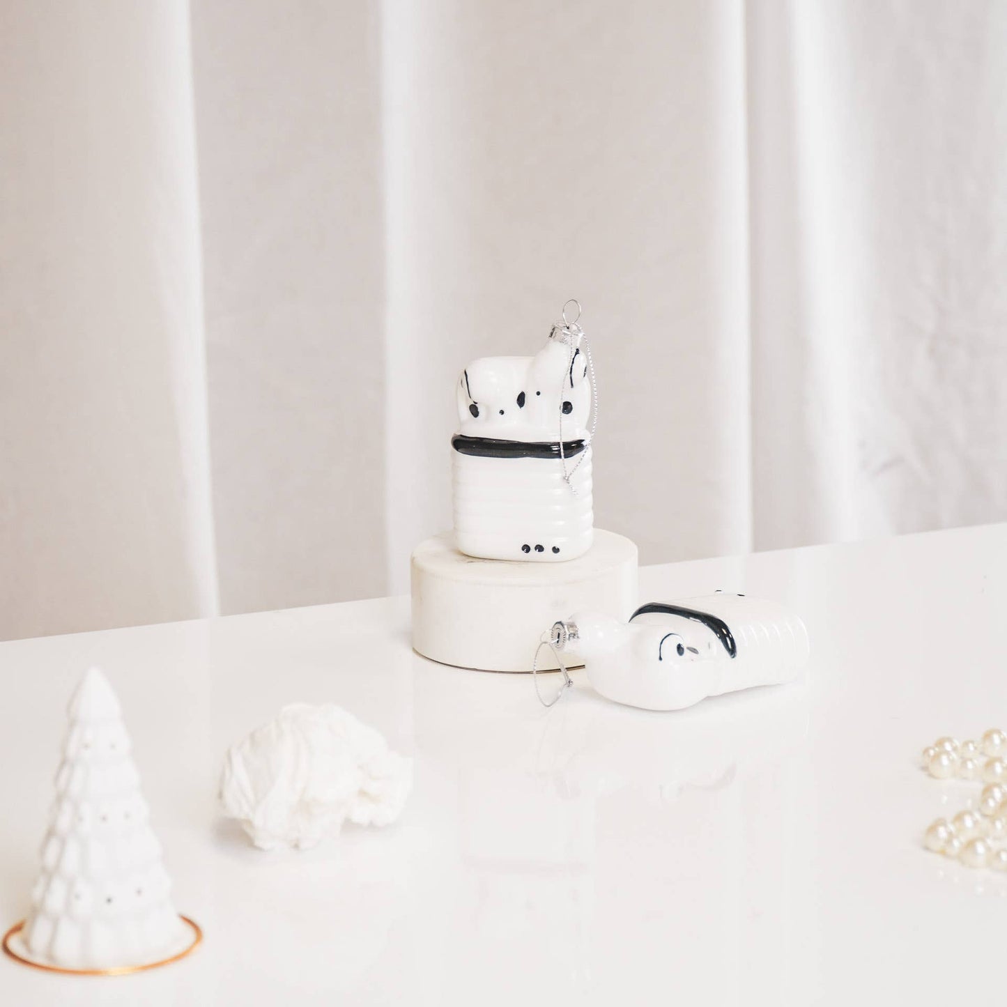 Boule de Noël Airpods par Housevitamin bv