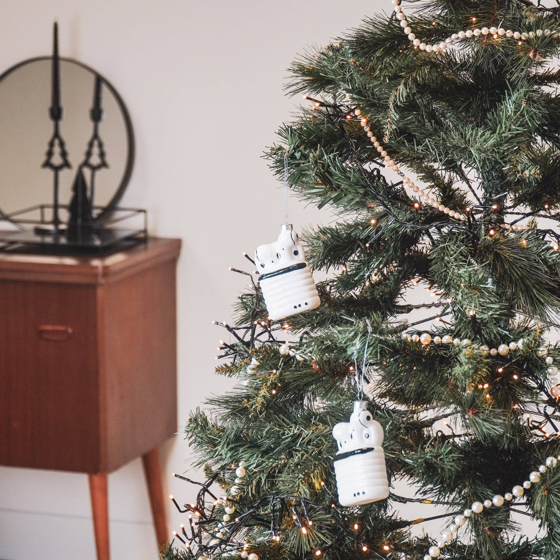 Boule de Noël Airpods par Housevitamin bv