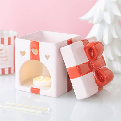 Brûle‑parfum de Noël « cadeau rose »